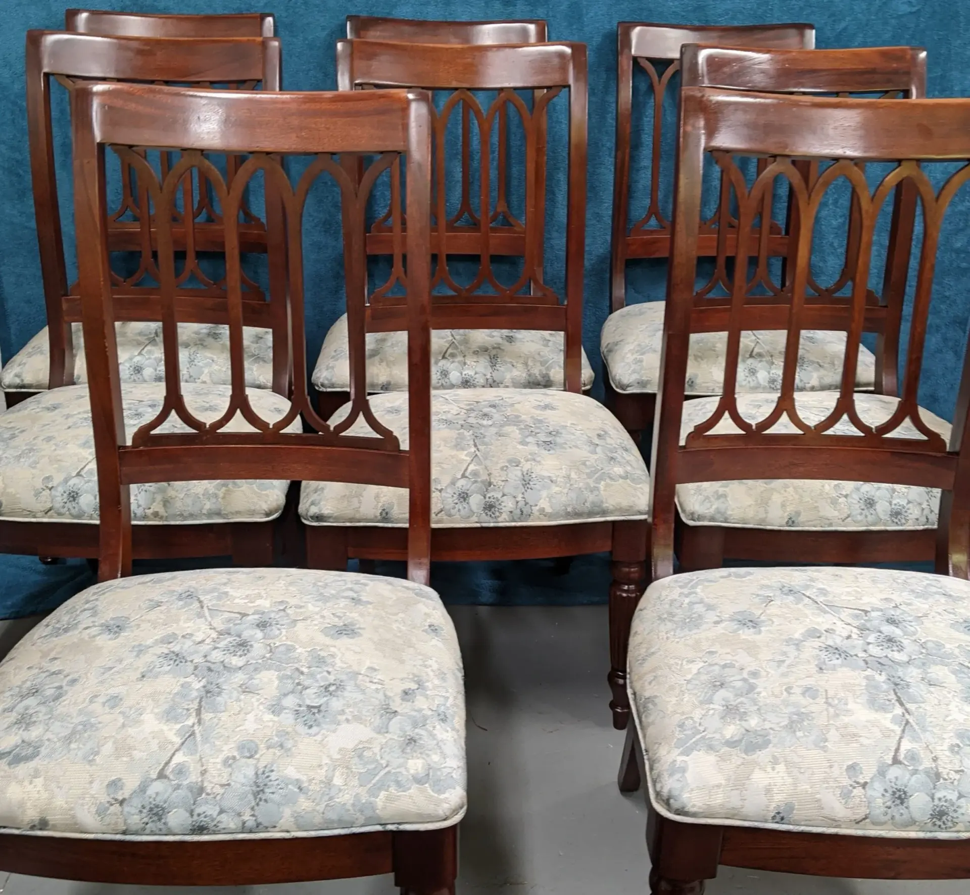 Pair of upholstered wood-frame chairs with patterned fabric
