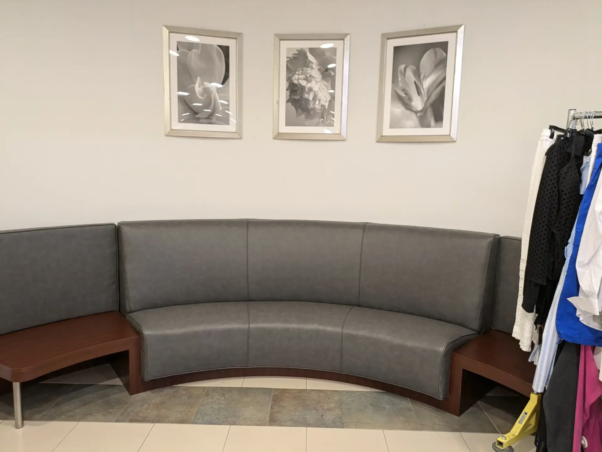 Renewed curved commercial seating installed in a customer-facing facility