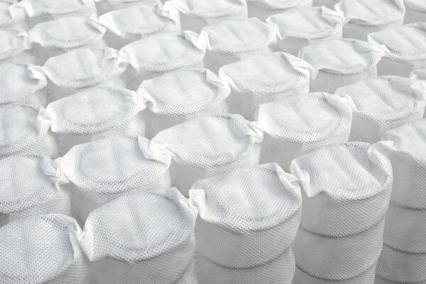 Individually wrapped Marshall coil springs used in cushion construction