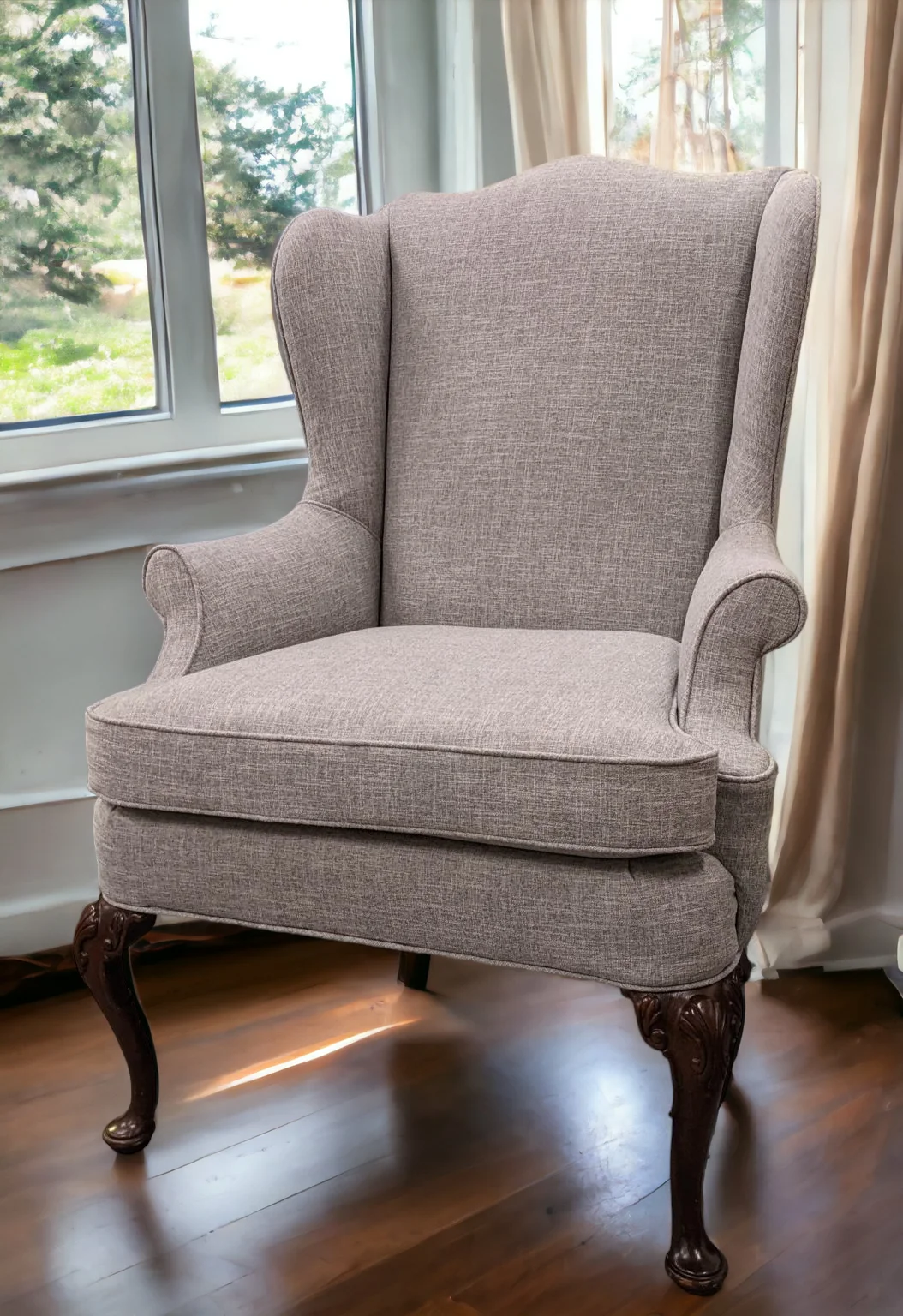 Finished upholstered wing chair in a residential interior