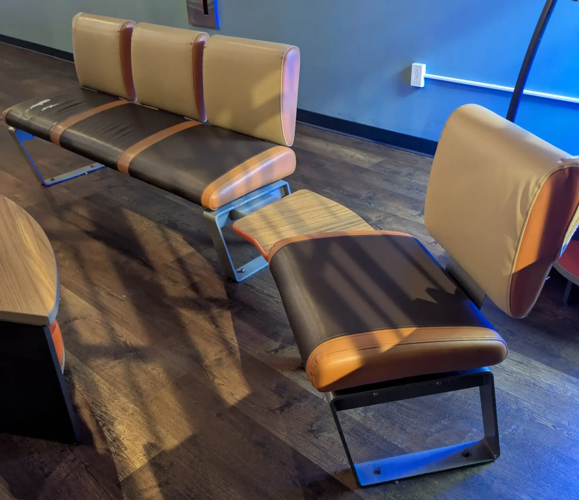 Seating with localized upholstery damage before repair