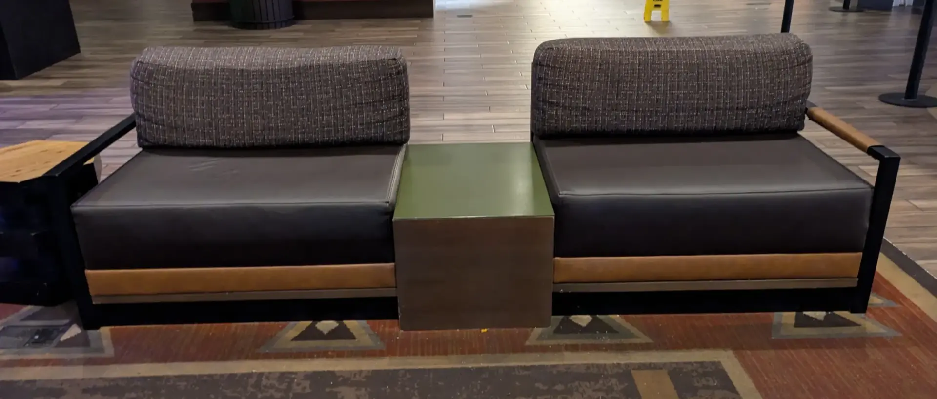 Finished upholstered commercial seating installed and ready for use in an active facility
